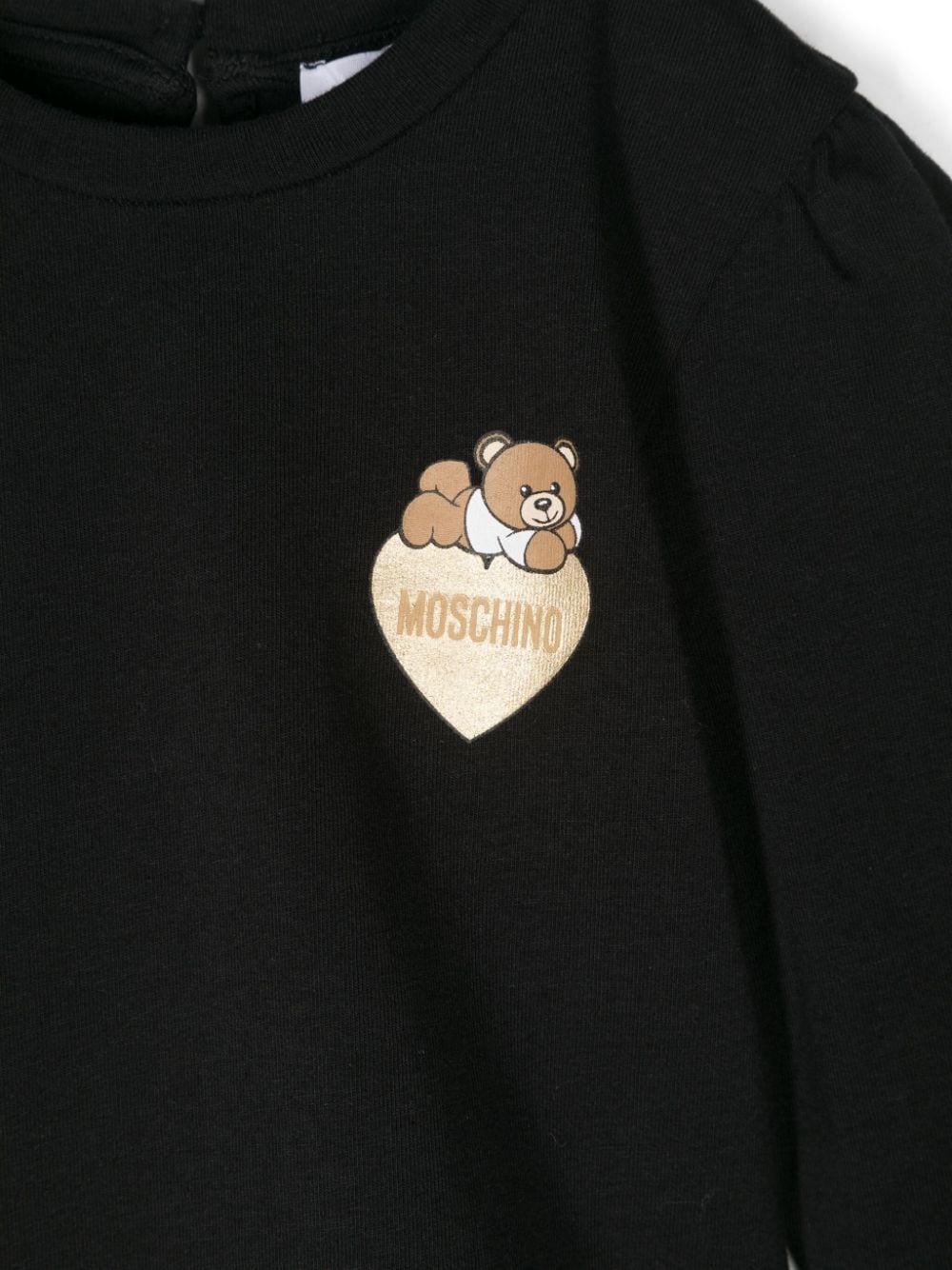 T-shirt per neonata nera Moschino Kids con stemma Teddy Bear e cuoricino MDO00PLBA10 60100 MOSCHINO KIDS 