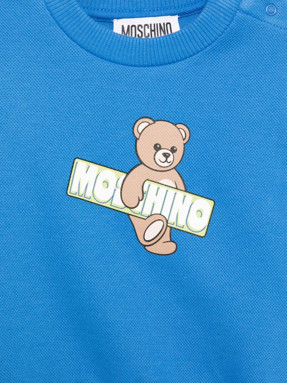Felpa per neonato Moschino Kids azzurra con Teddy Bear e logo sul davanti MWF060LCA90 40630 MOSCHINO KIDS 