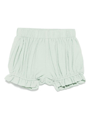 Pantaloncini per neonata Donsje Gwenda verde con orlo con ruches