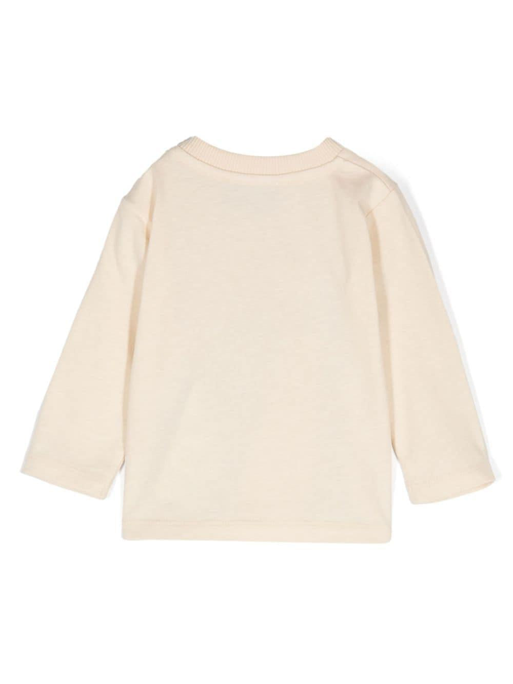 T-shirt per neonati Moschino Kids beige a maniche lunghe con stampa logo MOO00RLAA36 20404 MOSCHINO KIDS 