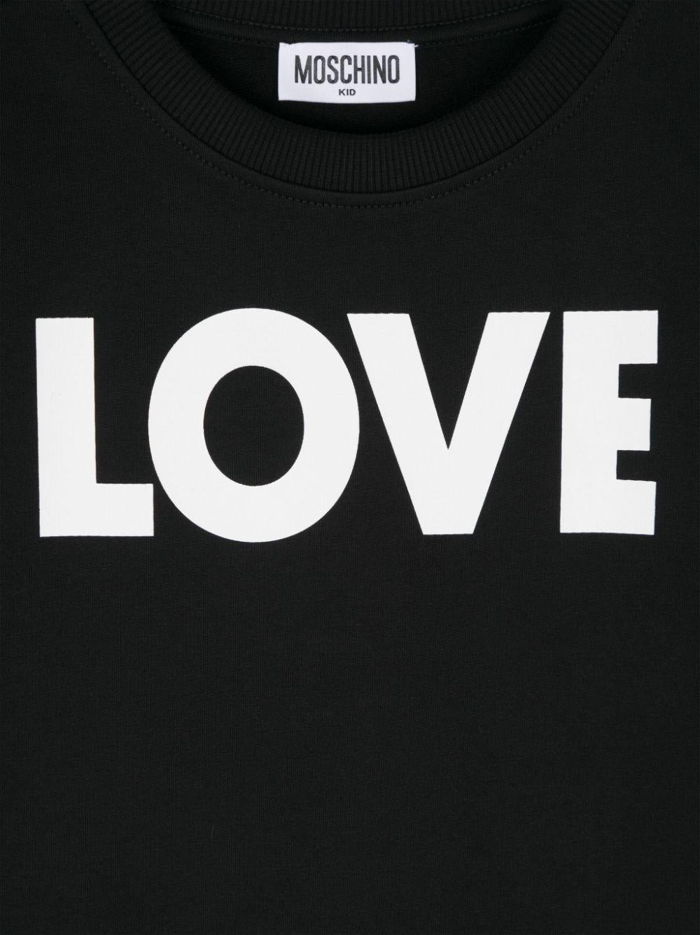 T shirt nera per bambina Moschino con stampa LOVE bianca HDV0FULCA61 60100 MOSCHINO KIDS 