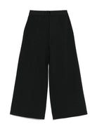 Pantaloni con banda logo per bambina Calvin Klein Kids nero con dettagli plissettati IG0IG02780 BEH CALVIN KLEIN KIDS 