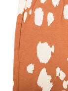 Pantaloni sportivi arancioni per bambina con stampa all over Stella McCartney Kids TV6Q70 Z2161 317BG STELLA McCARTNEY KIDS 
