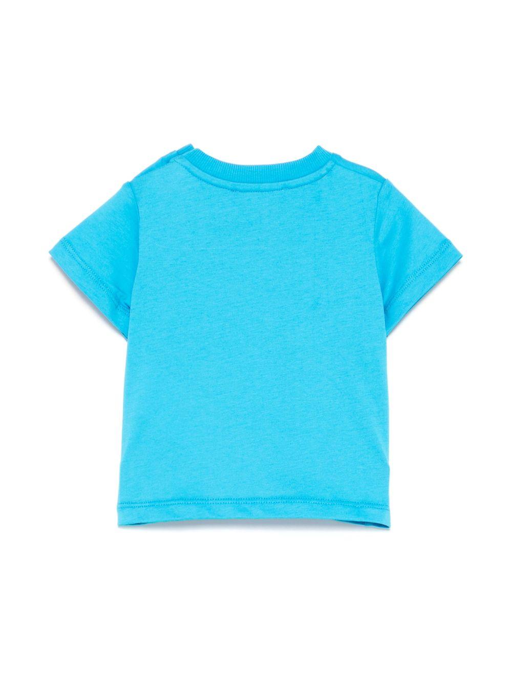 T-shirt per neonato Moschino Kids azzurro con motivo Teddy Bear MUM04DLAA24 41047 MOSCHINO KIDS 