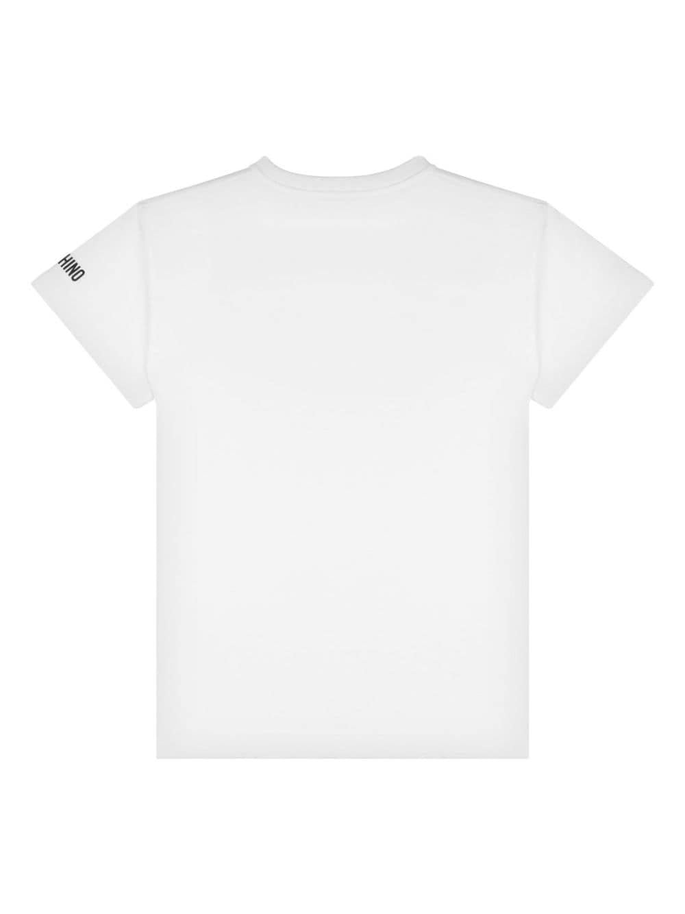 T shirt per bambina bianca Moschino con stampa LOVE nera HDV0FULCA61 10101 MOSCHINO KIDS 