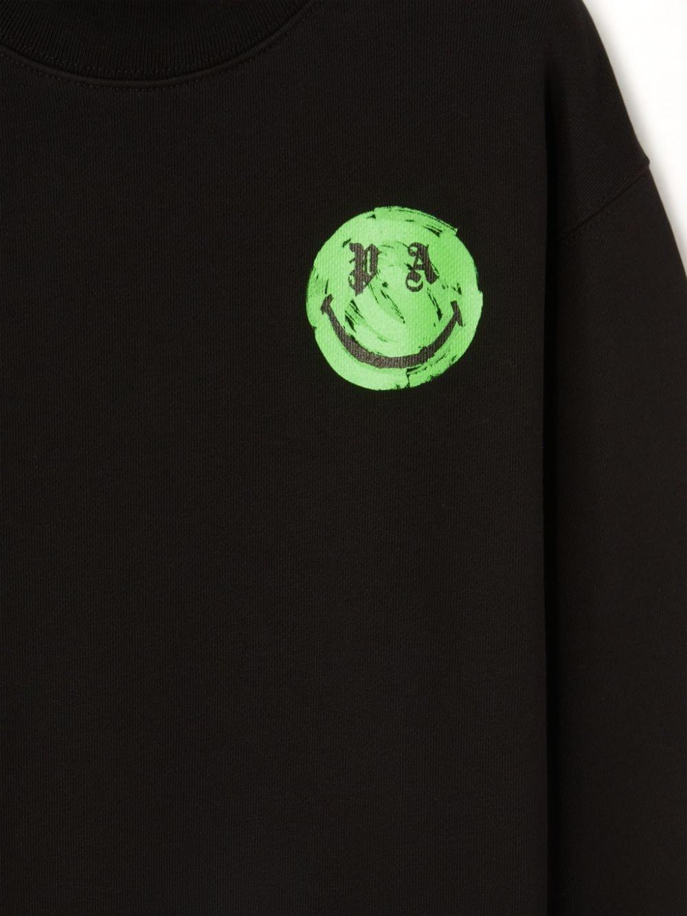 Felpa x Smiley per bambino Palm Angels Kids nero con girocollo PBBA012F24FLE007 1055 PALM ANGELS KIDS 