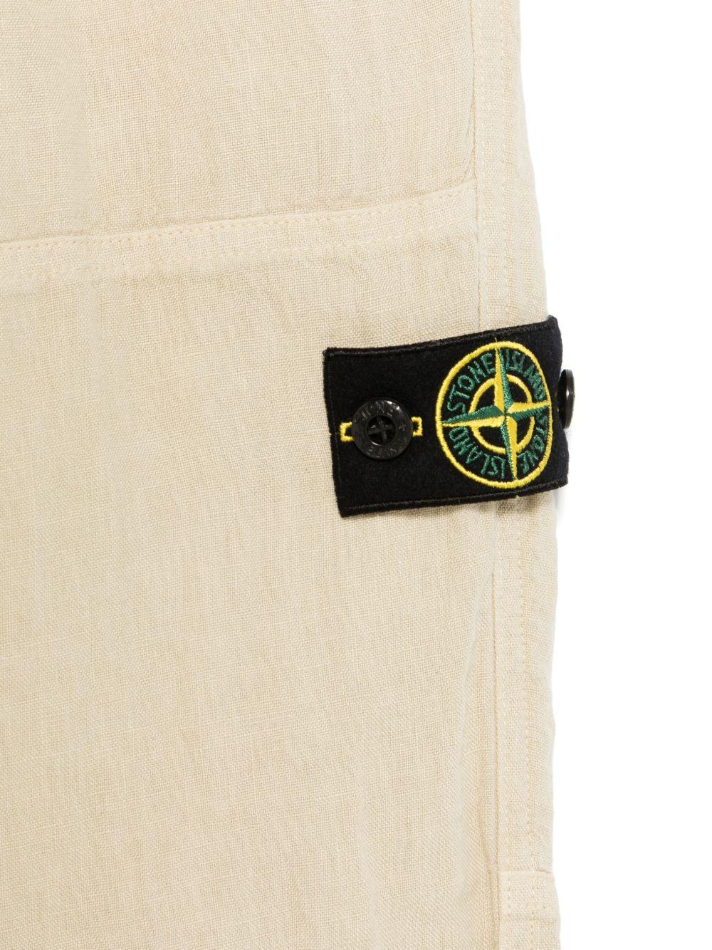Pantaloni per bambino Stone Island Junior beige con applicazione Compass K1S163100002S0145 V0095 STONE ISLAND JUNIOR 