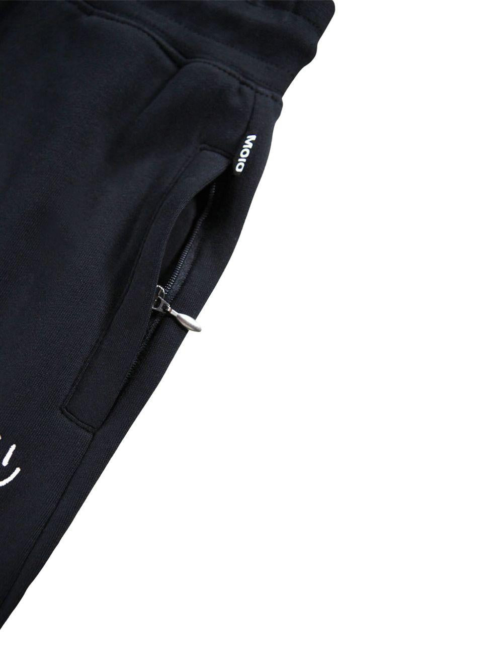 Pantaloni sportivi per bambino Molo Alvar nero con orli alle caviglie elasticizzati 6W25I202 0099 MOLO 