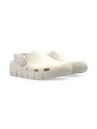 Sandali per bambini Birkenstock Kids Birki Flow beige con cinturino alla caviglia 1029567 EGGSHELL BIRKENSTOCK 