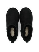 Stivali Ultra Mini per bambina UGG Kids neri con finitura idrorepellente<BR/> 1130750K BLK UGG 