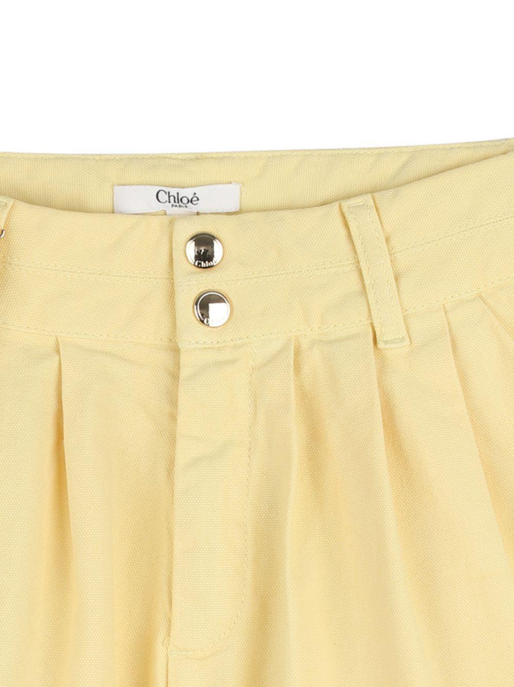 Shorts per bambina Chloé Kids giallo con dettaglio ciondolo C20842 52A CHLOE' KIDS 