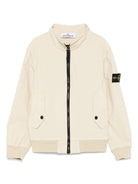 Giacca per bambino Stone Island Junior beige con applicazione Compass K1S164100004S0001 V0095 STONE ISLAND JUNIOR 