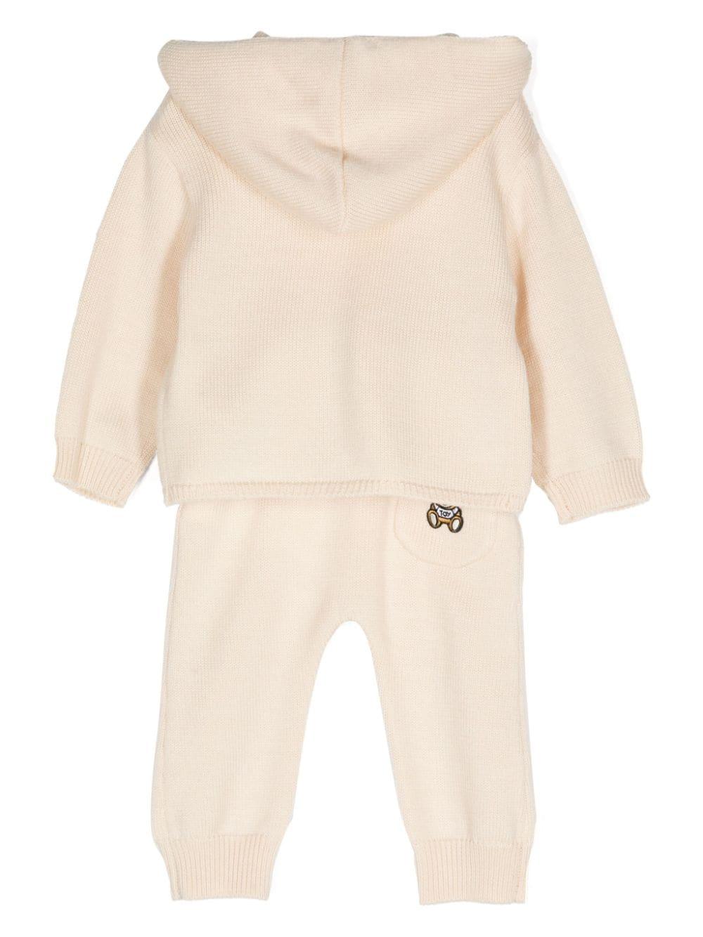 Set cardigan e pantaloni per neonati Moschino Kids beige con design lavorato a maglia MUK04XLHE06 20404 MOSCHINO KIDS 