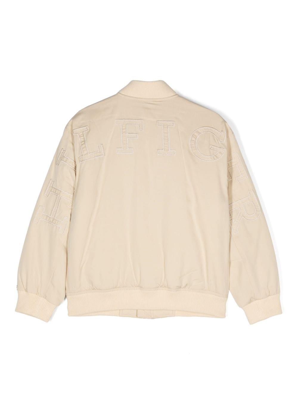 Bomber con applicazione per bambino Tommy Hilfiger Junior beige con colletto a coste KB0KB09091 AEX TOMMY HILFIGER JUNIOR 