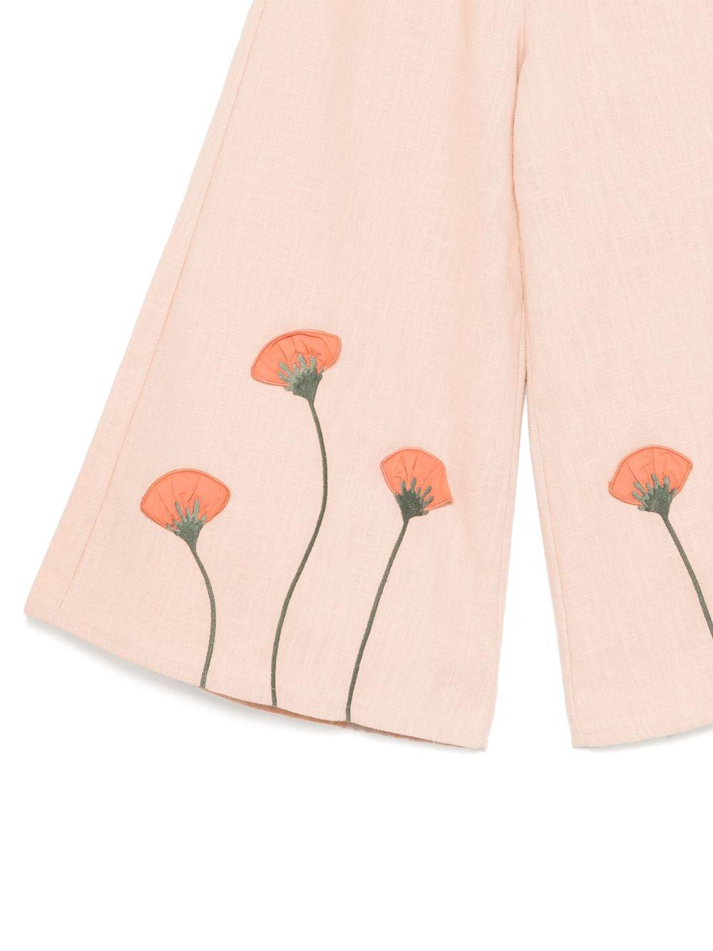 Pantaloni per bambina Donsje Fifis rosa con applicazione a fiori 4092301 00108 DONSJE 