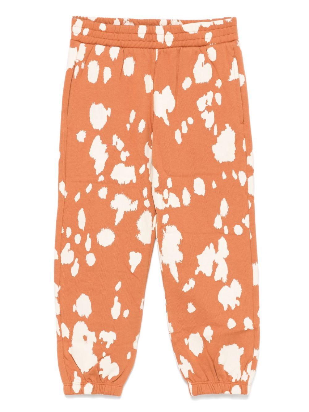 Pantaloni sportivi arancioni per bambina con stampa all over Stella McCartney Kids TV6Q70 Z2161 317BG STELLA McCARTNEY KIDS 