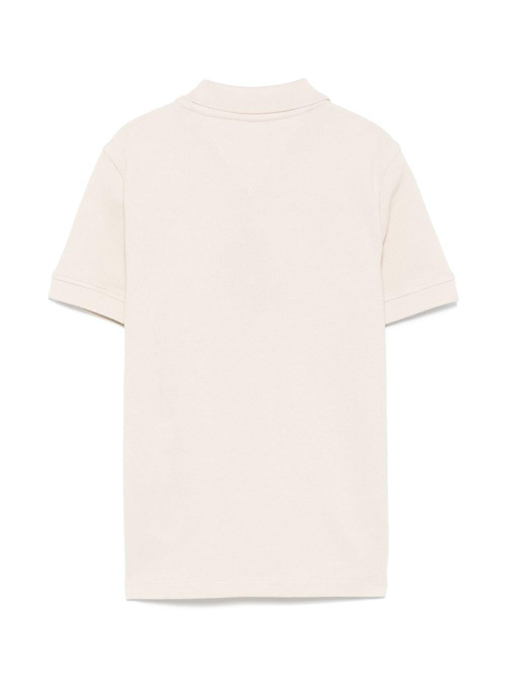 Polo Monotype per bambino Tommy Hilfiger Junior beige con logo sulla manica KB0KB09391 ACI TOMMY HILFIGER JUNIOR 