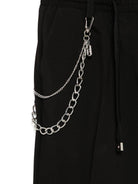 Pantaloni per bambino John Richmond Junior nero con applicazione logo RBP25227PA BLACK JOHN RICHMOND JUNIOR 
