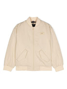 Bomber con applicazione per bambino Tommy Hilfiger Junior beige con colletto a coste KB0KB09091 AEX TOMMY HILFIGER JUNIOR 