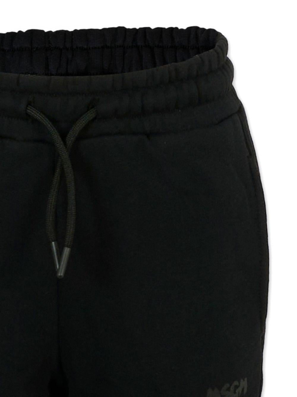 Pantaloni sportivi per bambino MSGM Kids neri con tasche laterali F5MSJUFP023 110 MSGM KIDS 