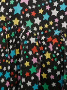 Abito per bambina Stella McCartney Kids nero con stampa stelle all over TV1C40 Z2069 930MC STELLA McCARTNEY KIDS 
