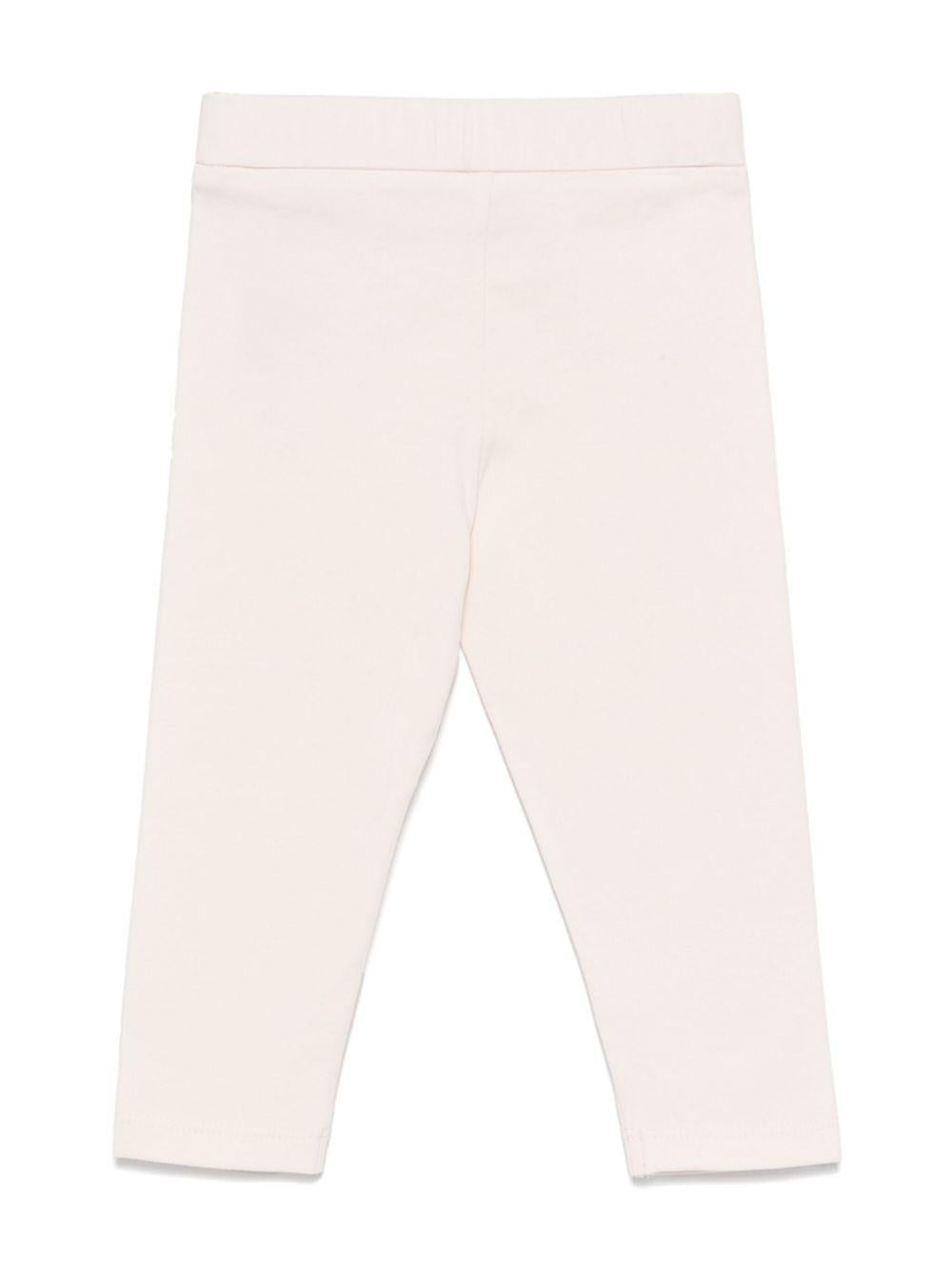 Leggings per neonata Moncler Enfant rosa con applicazione logo sulla gamba K19518H0000289AUM 529 MONCLER ENFANT 