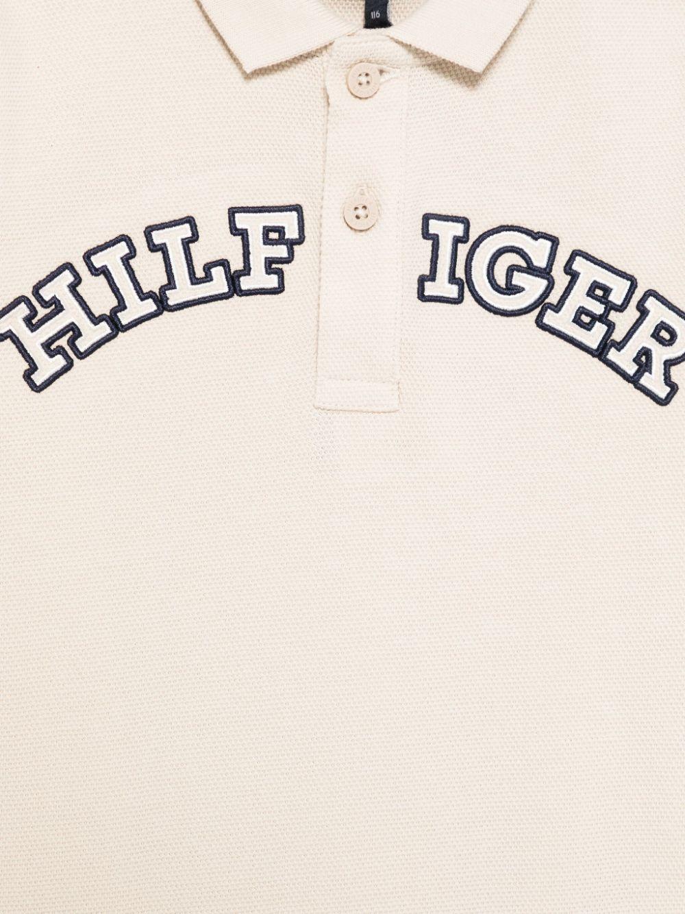 Polo Monotype per bambino Tommy Hilfiger Junior beige con logo sulla manica KB0KB09391 ACI TOMMY HILFIGER JUNIOR 