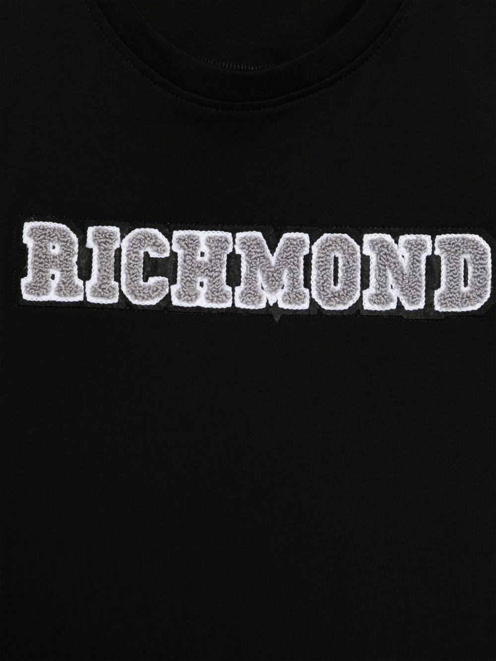 T-shirt per bambino John Richmond Junior nero con applicazione frontale con logo RBP25178TS BLACK JOHN RICHMOND JUNIOR 