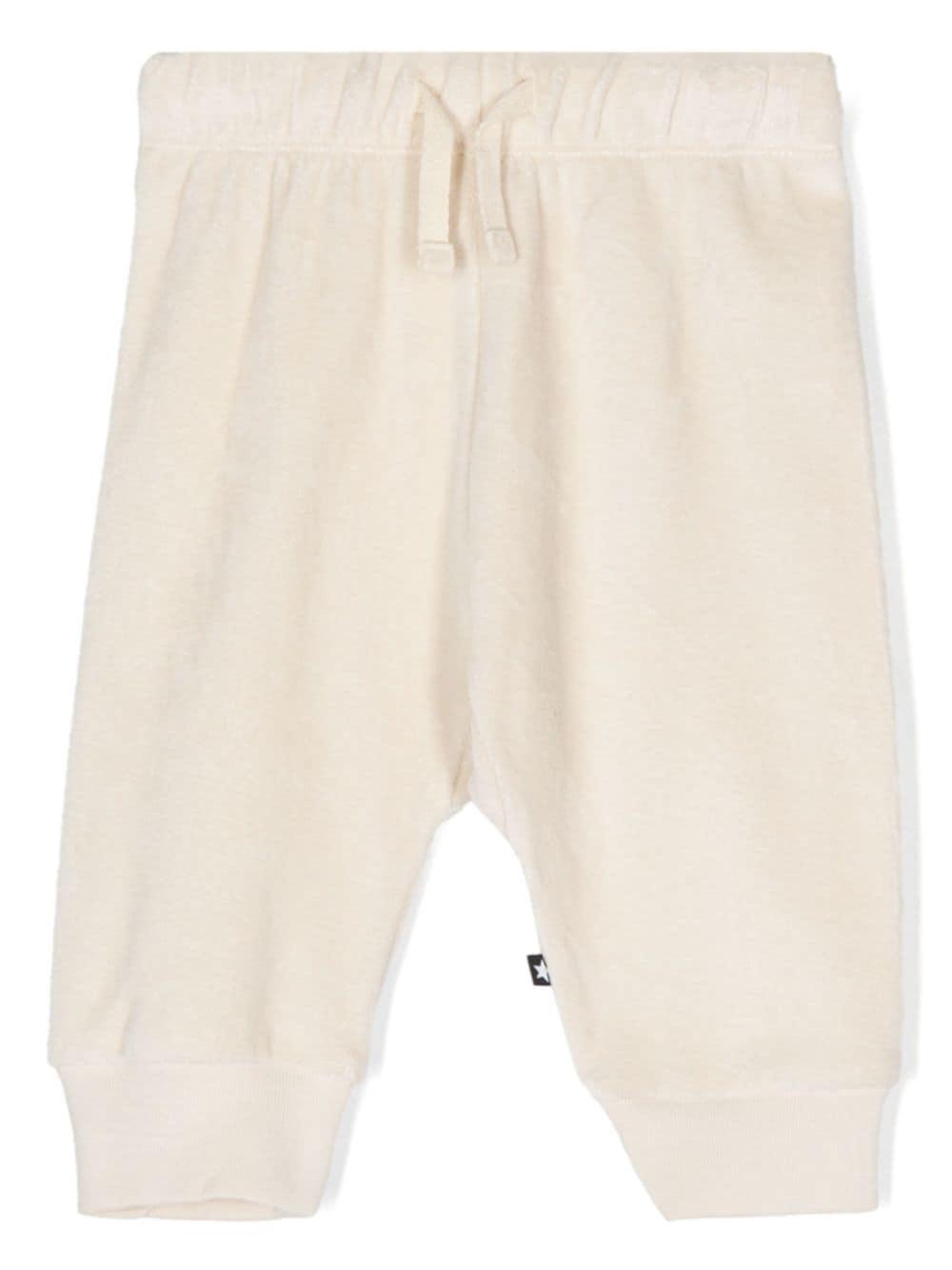 Pantaloni sportivi per neonato Molo Sigo bianco in velluto 6W24I223 8955 MOLO 