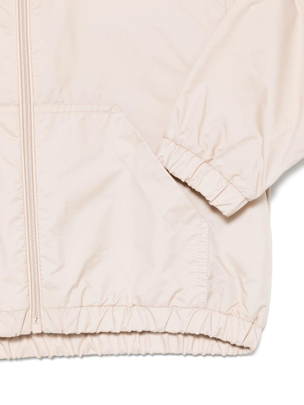 Giubbino per bambina Moncler Enfant beige con due tasche superiori a marsupio K19541A0008053A5E 21G MONCLER ENFANT 