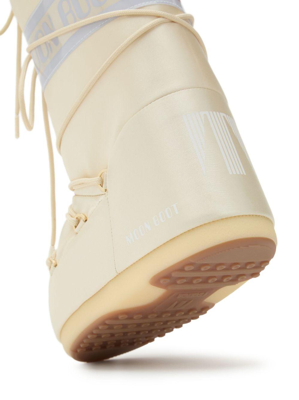 Stivali da neve Icon per bambini Moon Boot Kids bianchi con fascia con logo 80D1403060 L020 MOON BOOT 