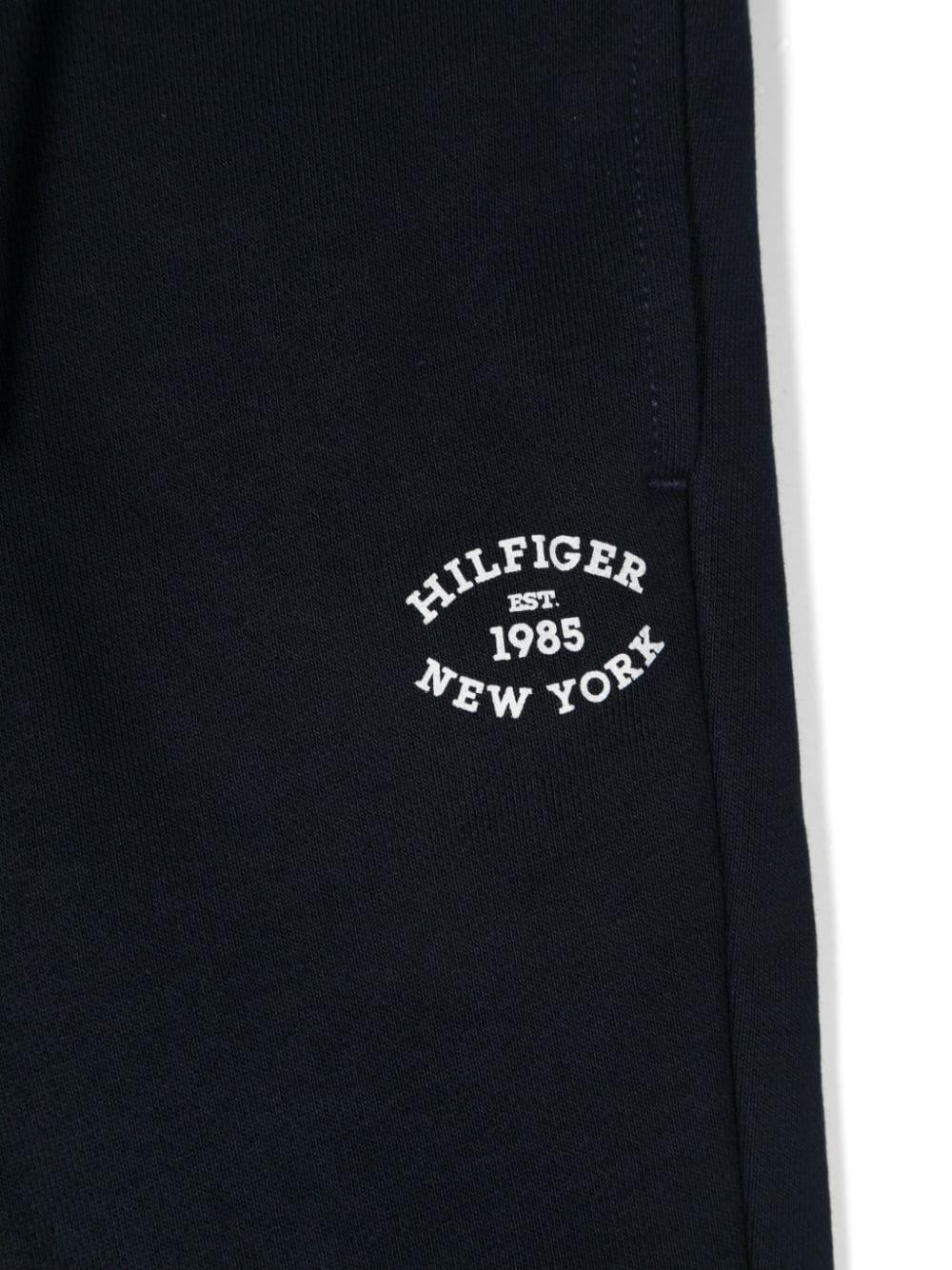 Pantaloni da tuta con stampa logo per neonato Tommy Hilfiger blu con caviglie a coste KB0KB09065NB DW5 TOMMY HILFIGER JUNIOR 