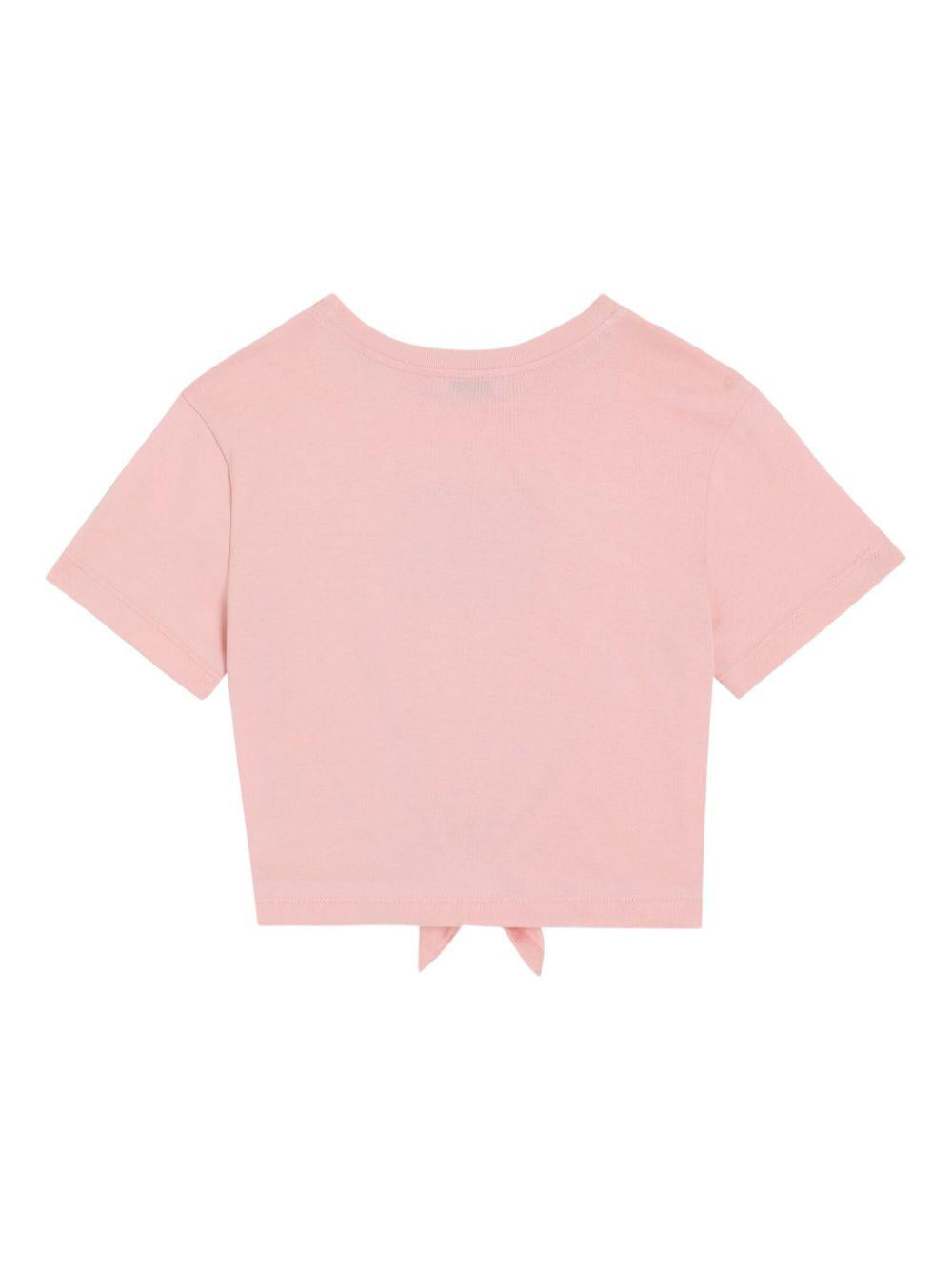 T-shirt con nodo per bambina Dolce & Gabbana Kids rosa con logo con borchie L5JTOV G7O0X F0660 DOLCE & GABBANA KIDS 