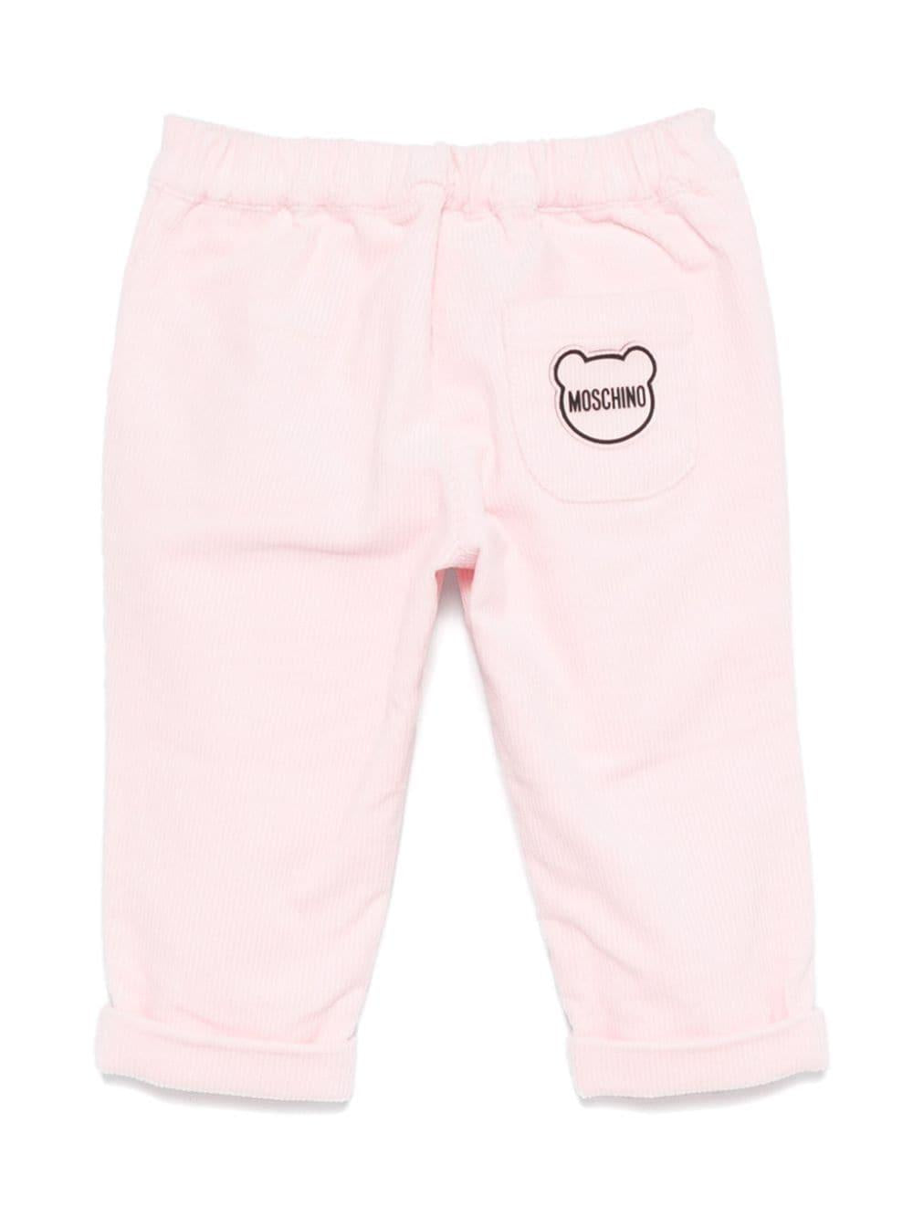 Pantaloni per neonato Moschino Kids rosa a coste con logo sul retro MDP038LVA05 50209 MOSCHINO KIDS 