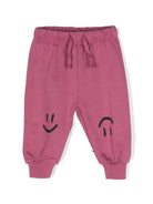 Pantaloni sportivi per neonato Molo Simeon rosa con stampa smiley 6W24I224 8972 MOLO 