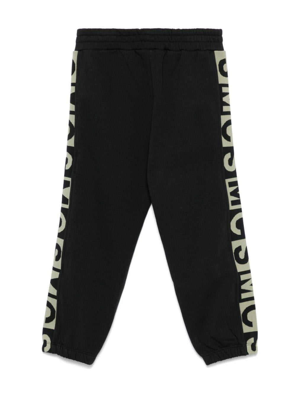 Pantaloni sportivi per bambino Stella McCartney Kids neri con logo jacquard TV6R60 Z0409 930 STELLA McCARTNEY KIDS 