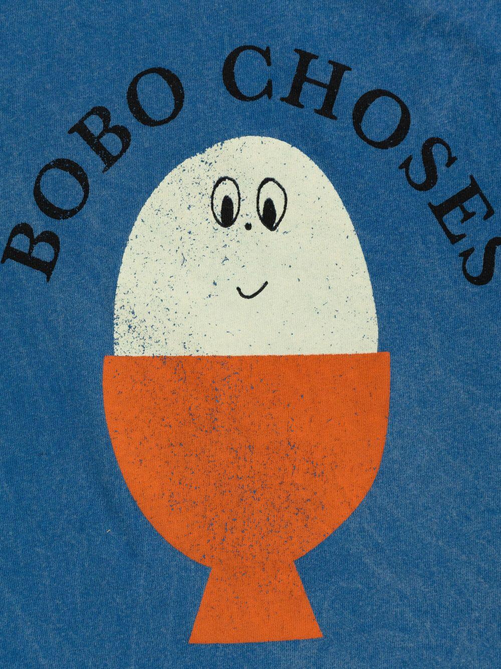 T-shirt per neonato Bobo Choses Morning Egg blu con stampa sul petto B125AB011 421 BOBO CHOSES 