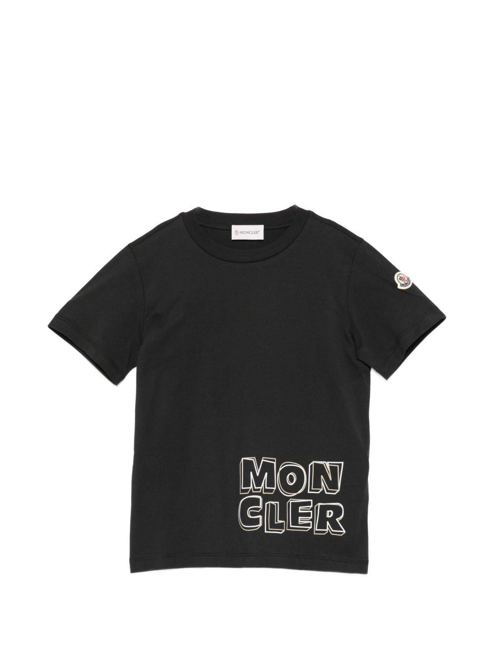 T-shirt per bambino Moncler Enfant nera con stampa logo L19548C0000689AFV 999 MONCLER ENFANT 