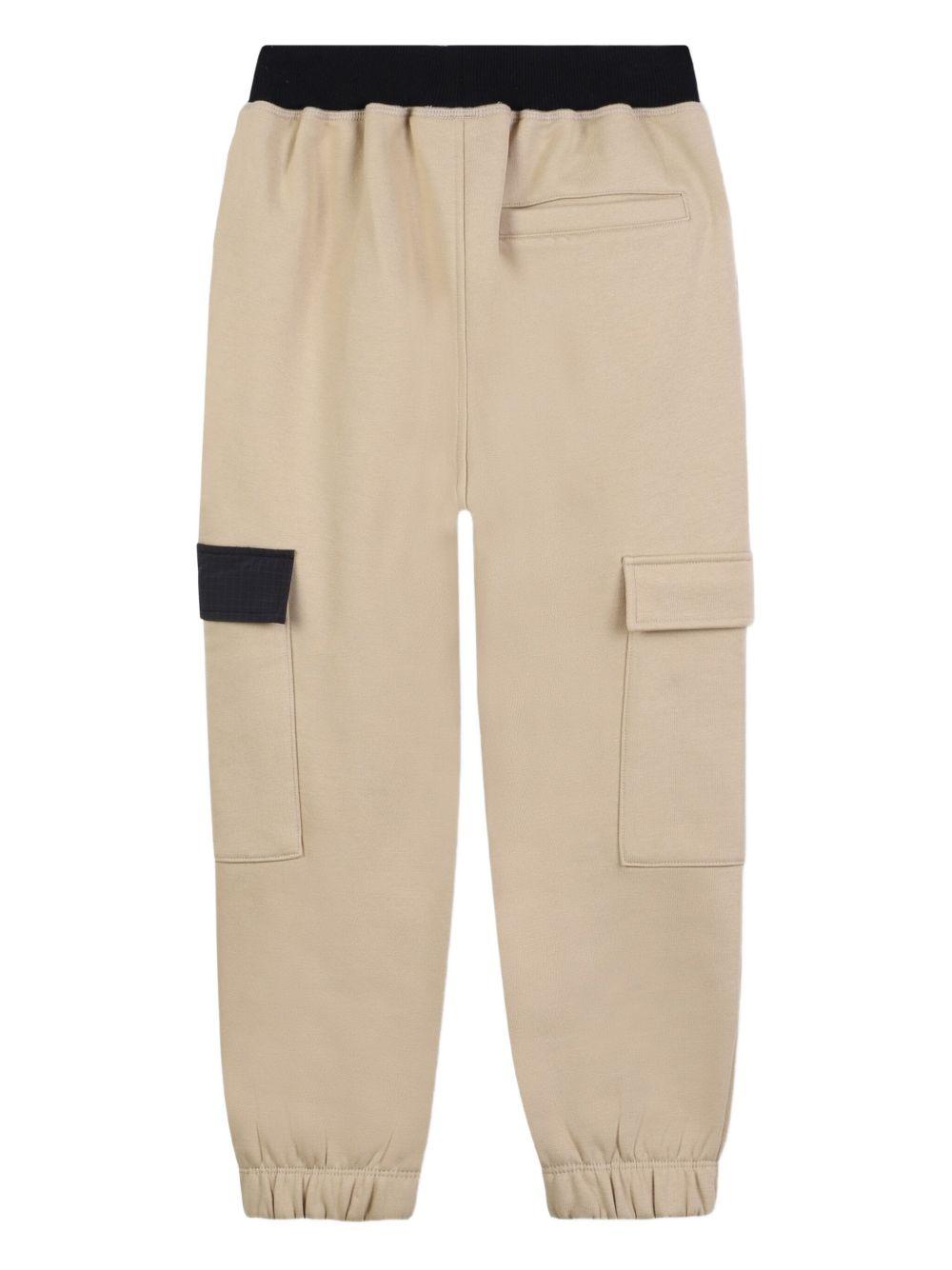 Pantaloni sportivi per bambino Hugo Kids beige con tasche cargo laterali G00477 249 Hugo 