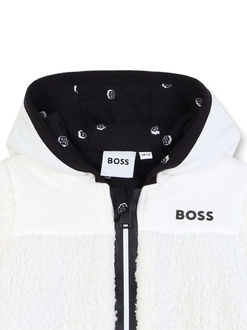 Tutina per neonato Boss Kids bianca con zip a contrasto J52488 117 BOSS KIDS 