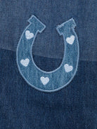 Jeans per bambina Stella McCartney Kids in denim blu con applicazione sul davanti - Rubino Kids