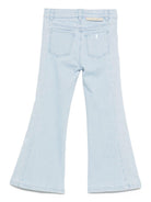 Jeans per bambina Stella McCartney Kids in denim con gamba a zampa - Rubino Kids
