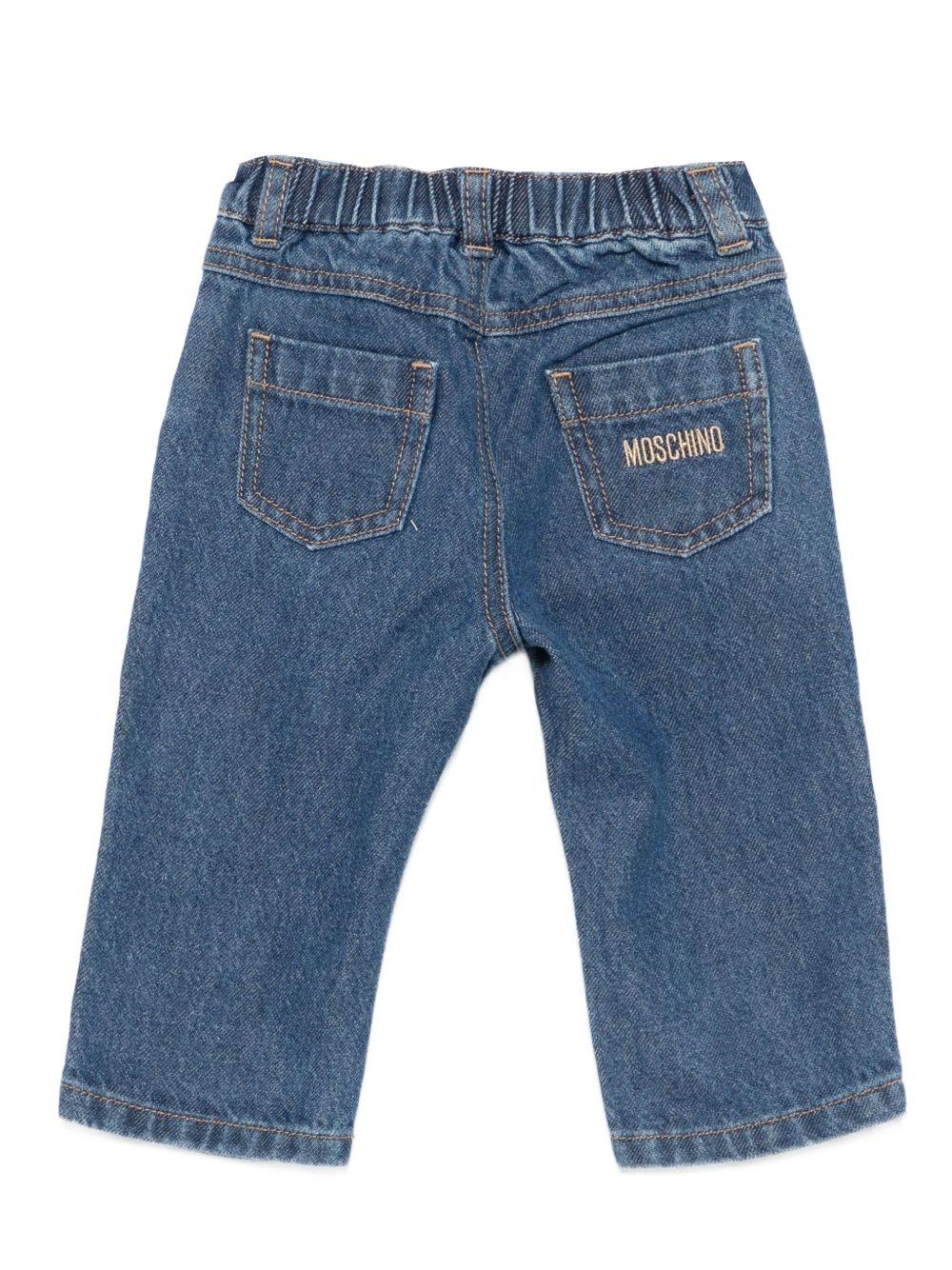 Jeans per neonata Moschino Kids in denim con ricamo orsetto - Rubino Kids