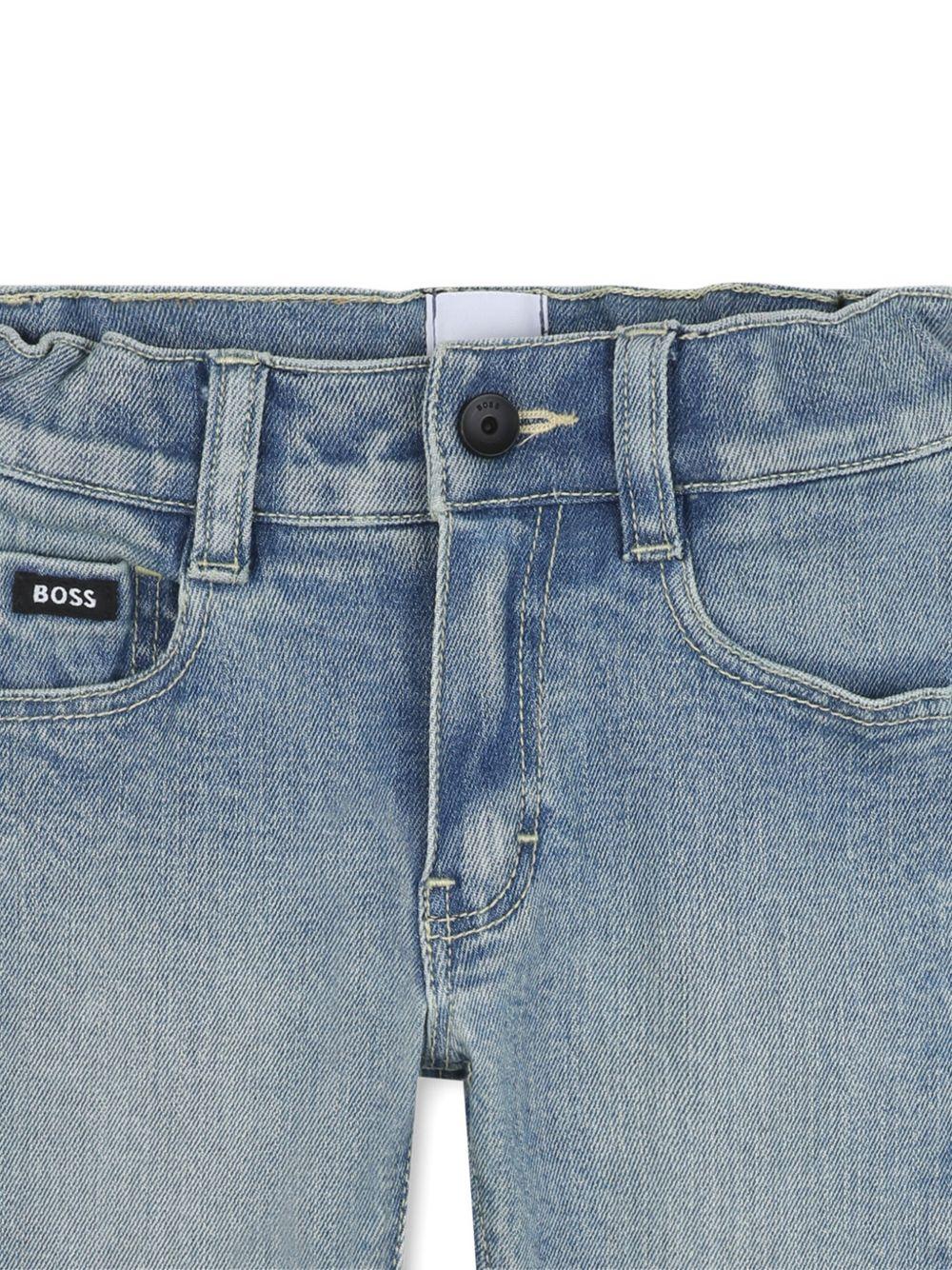 Jeans per neonato BOSS Kids denim con applicazione logo - Rubino Kids