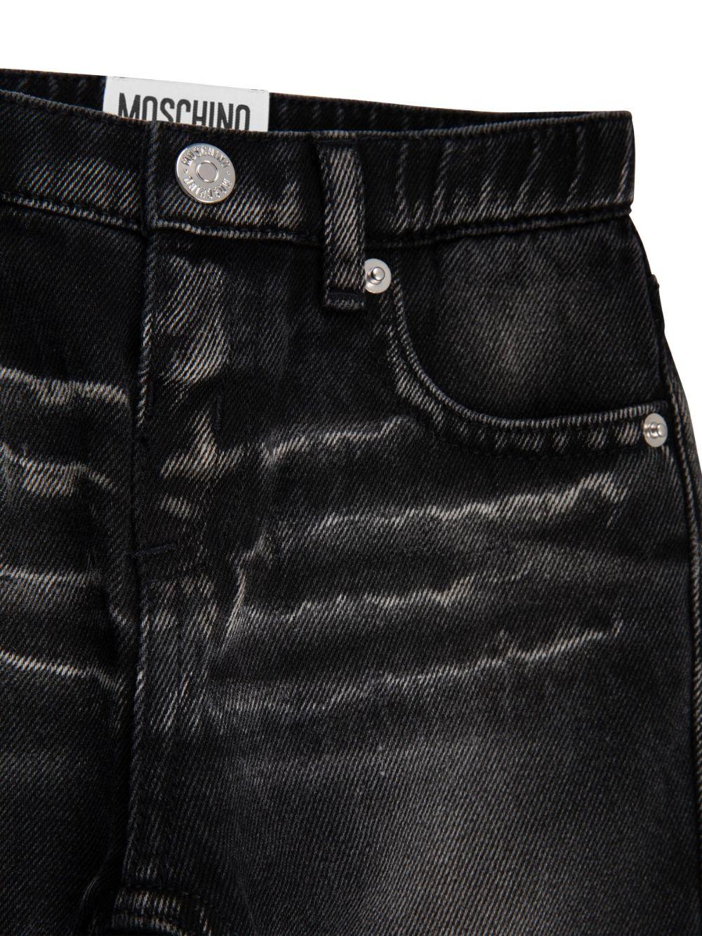 Jeans per neonato Moschino Kids in denim nero con effetto vissuto - Rubino Kids