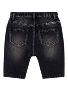 Jeans per neonato Moschino Kids in denim nero con effetto vissuto - Rubino Kids