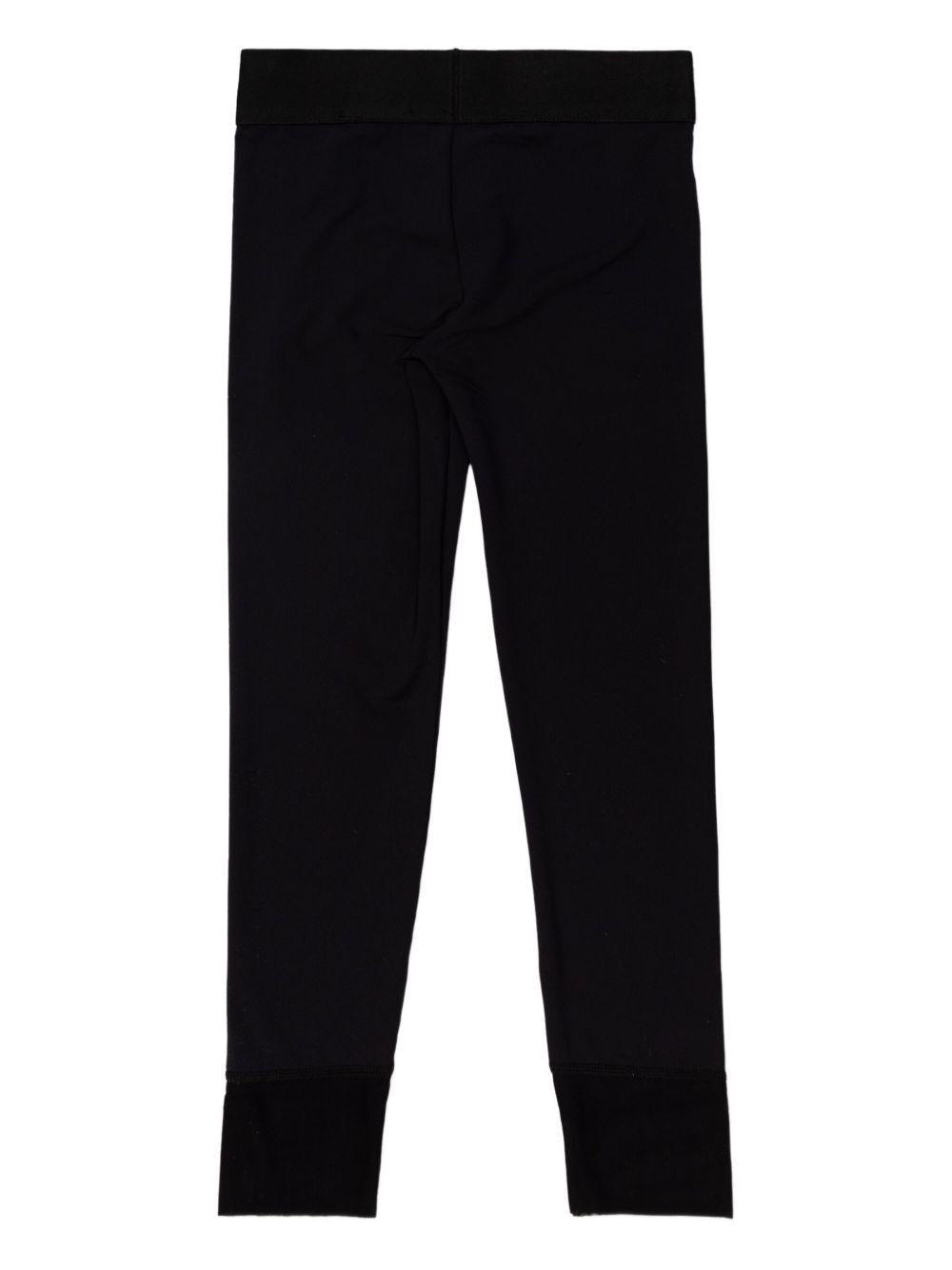 Leggings per bambina Stella McCartney Kids nero con stampa labbra - Rubino Kids