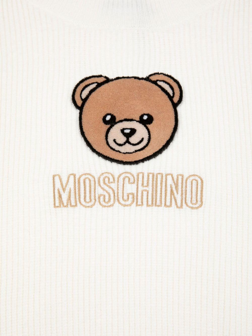 Maglione per bambina Moschino Kids bianco con motivo Teddy Bear - Rubino Kids