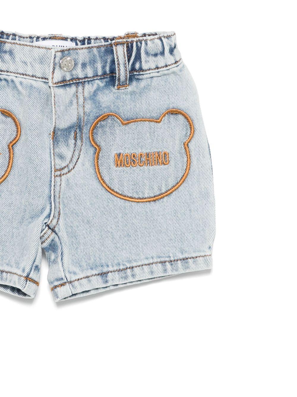 Pantaloncini con logo ricamato per neonata Moschino Kids azzurro con passanti per cintura - Rubino Kids