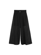 Pantaloni per bambina DKNY Kids neri con placca logo - Rubino Kids